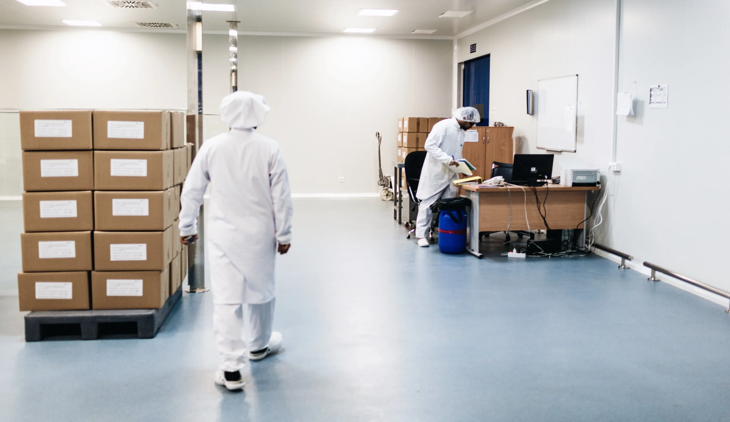 Two men working in pharma logistics