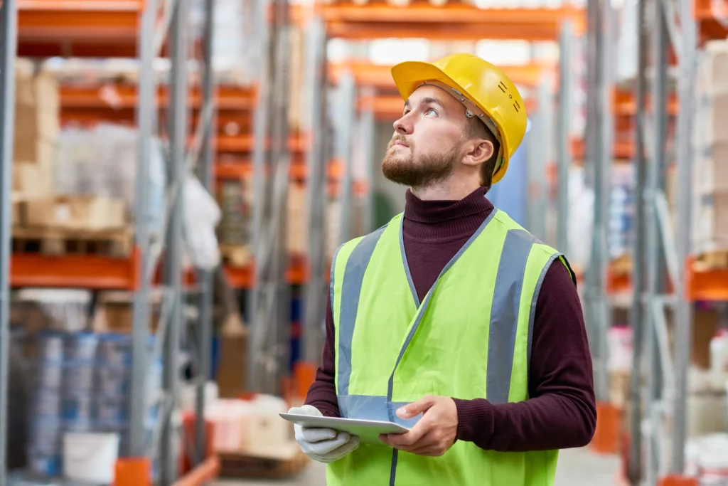 Warehouse worker searching for product